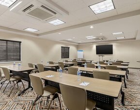 Meeting facility featuring classroom-style seating, presentation equipment and a flexible event space for business gatherings at Candlewood Suites Meridian.