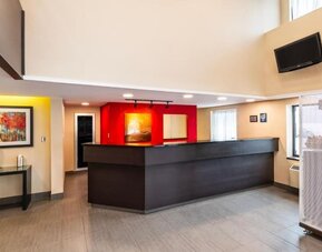 Reception desk featuring modern finishes and a welcoming check-in area at Comfort Inn Truro.