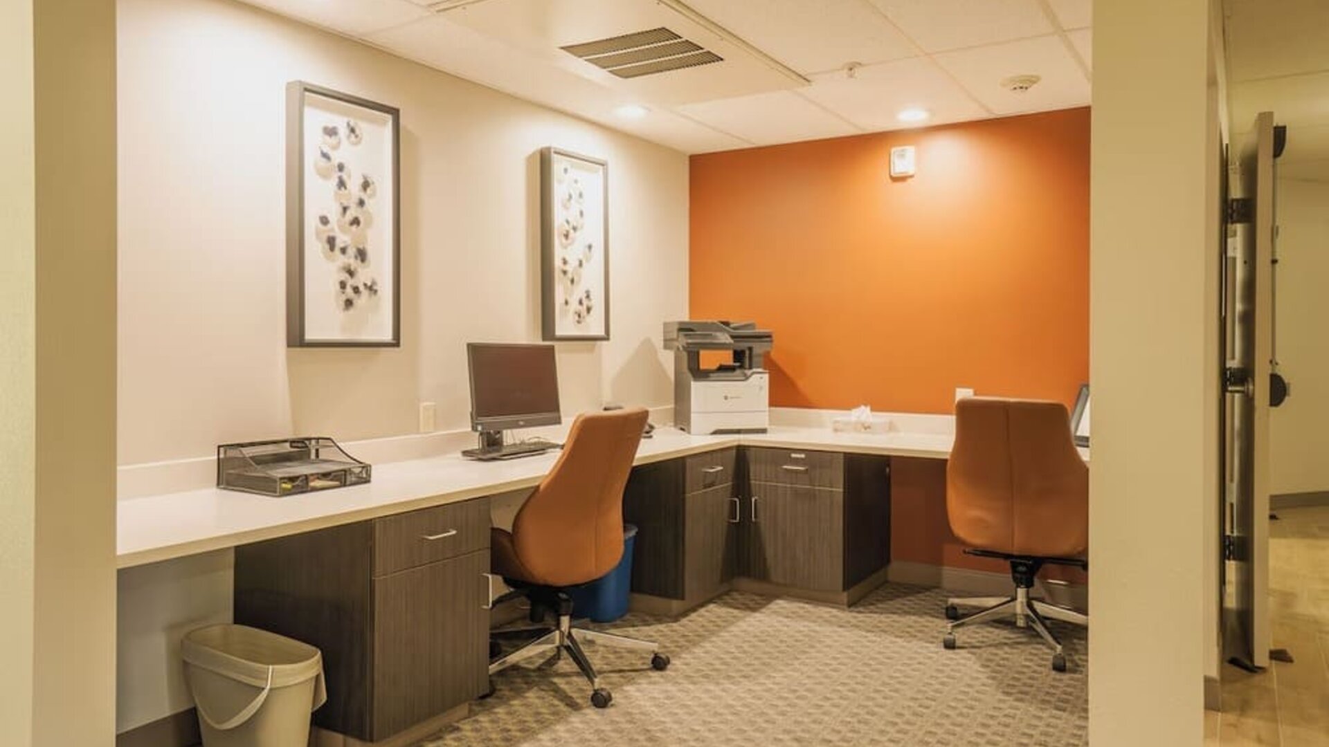 Business center featuring computer workstations, printing services and a dedicated workspace for productivity at Candlewood Suites Boise.