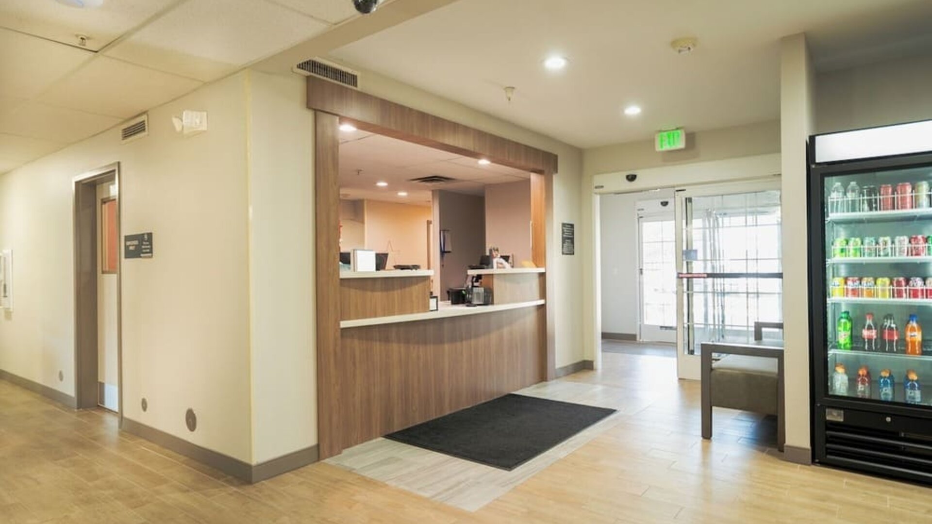 Reception area featuring a welcoming front desk, refreshment station and convenient access to hotel amenities at Candlewood Suites Boise.
