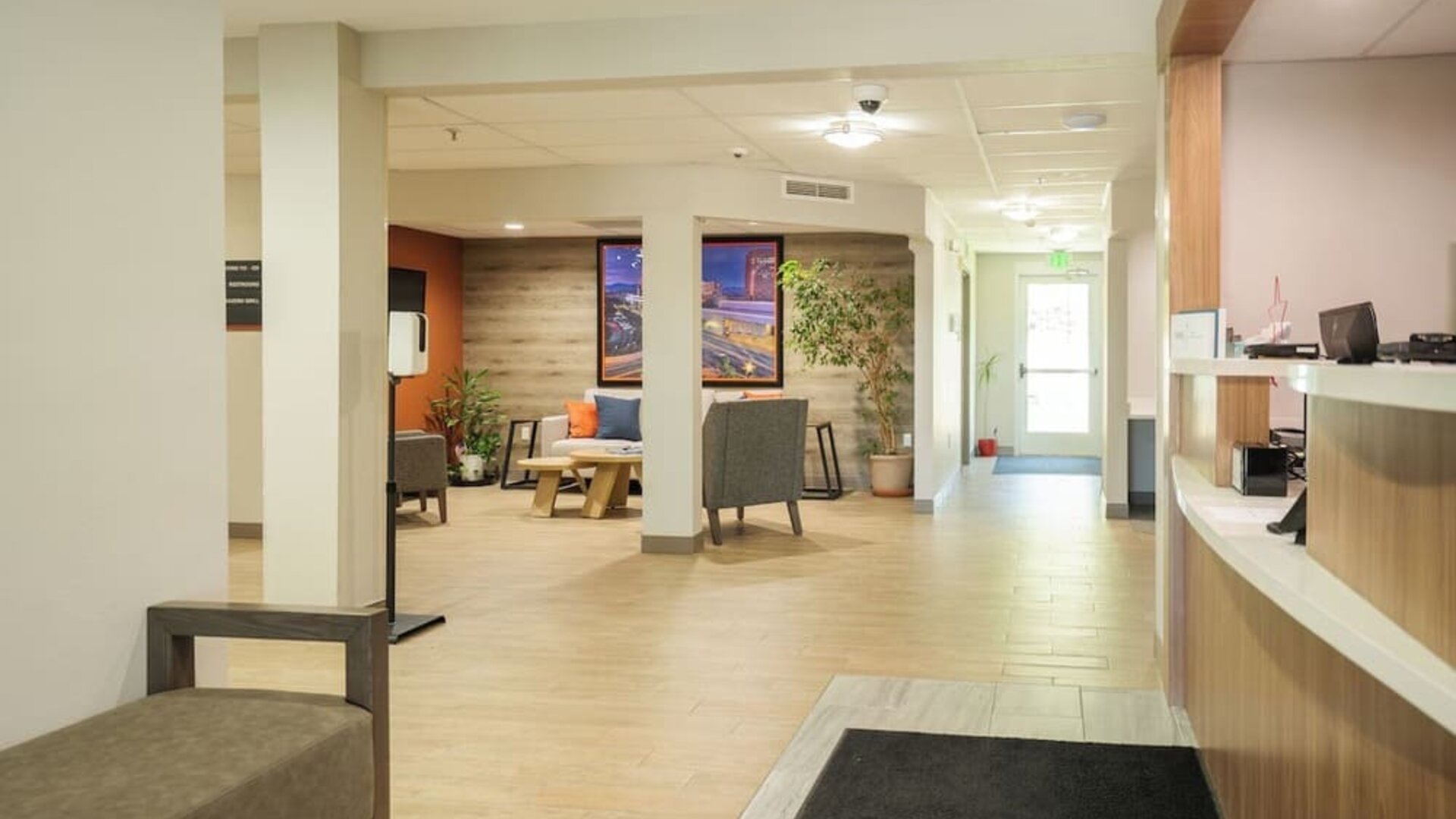 Reception lobby featuring open walkways, comfortable seating and a modern guest services area at Candlewood Suites Boise.