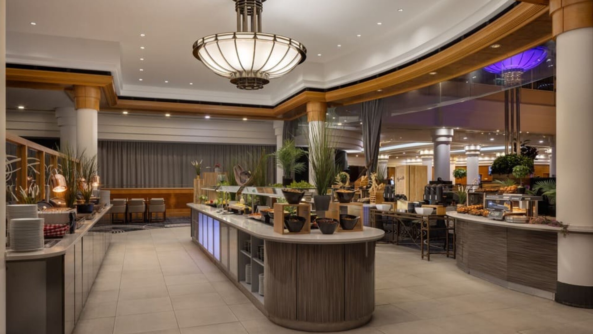 Contemporary hotel buffet area with large selection of meals to choose from. 