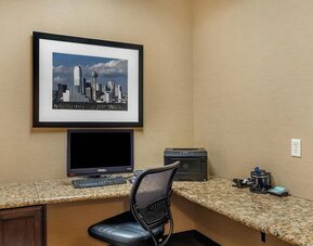 Business centre with a desktop computer, printer, and spacious granite workstations at Comfort Suites Frisco.