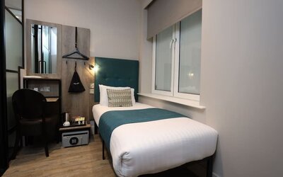 Day use room with work desk at Euston Square Hotel.