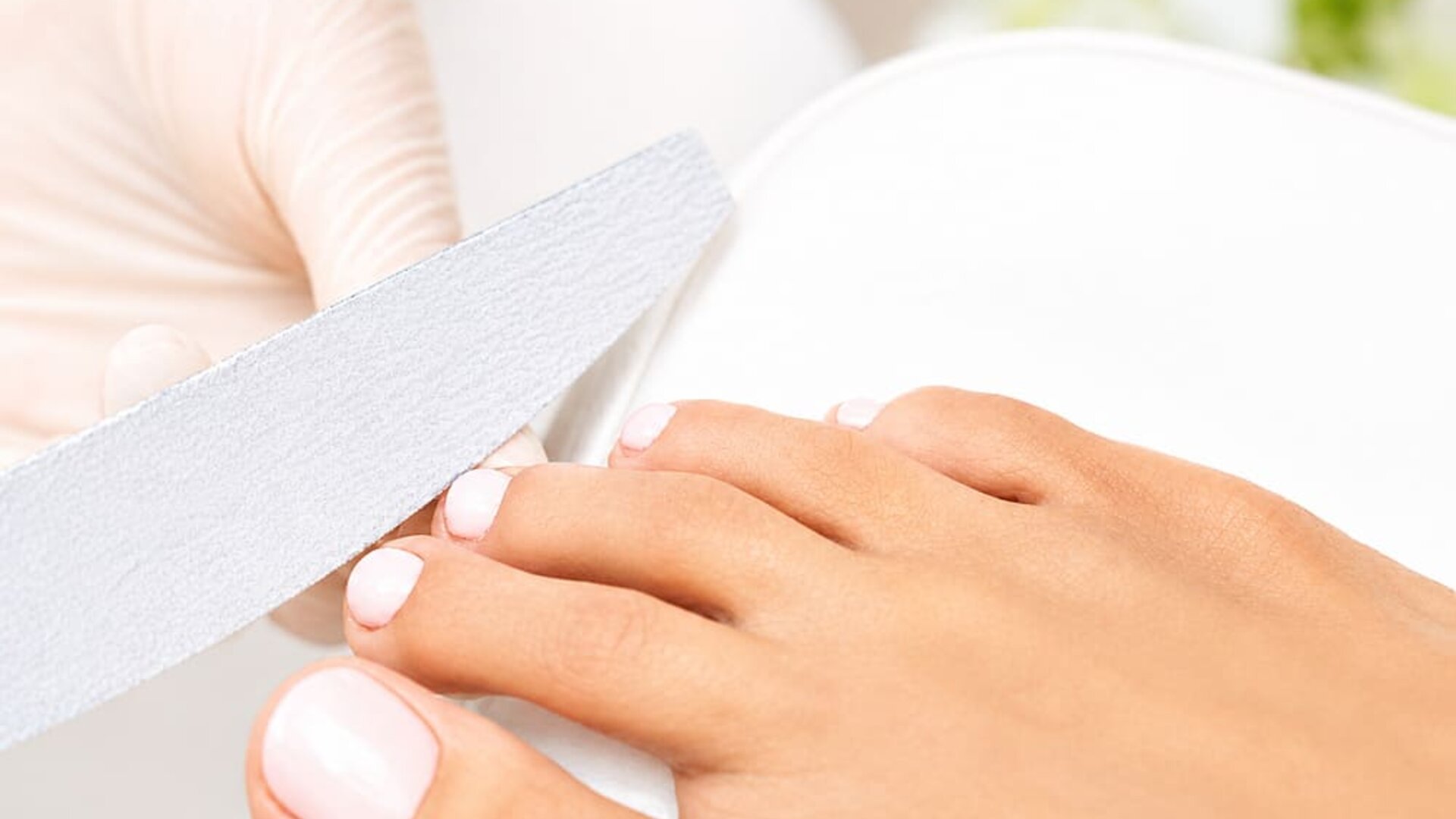 Pedicure treatment at SKYLARANNA Resort & Spa, featuring professional nail care and grooming.