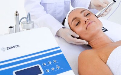 Facial treatment at SKYLARANNA Resort & Spa, featuring a professional skincare treatment using specialised spa equipment.