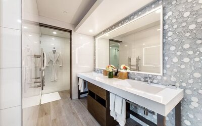 Guest bathroom with shower at Shade Hotel Manhattan Beach.