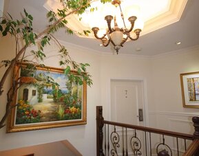 Hotel interior with lounge area at Parc Suites Hotel.