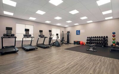 Equipped fitness center with treadmills at Hampton Inn By Hilton Port Hope.