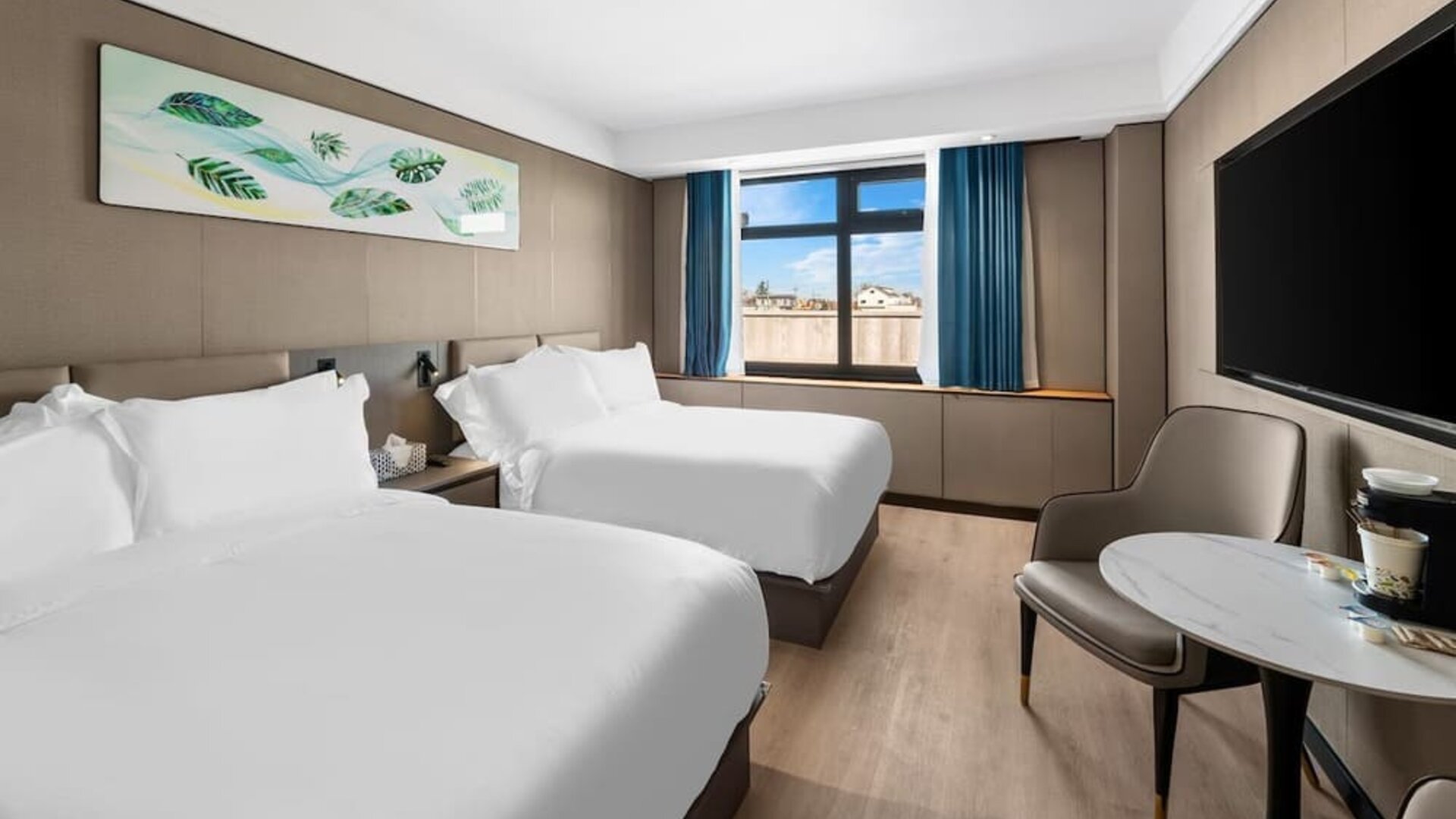 Queen beds at Ly New York Hotel.