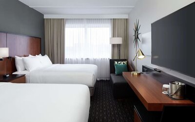 Day use Twin room with TV, work desk and private bathroom at DoubleTree By Hilton Montreal Airport.