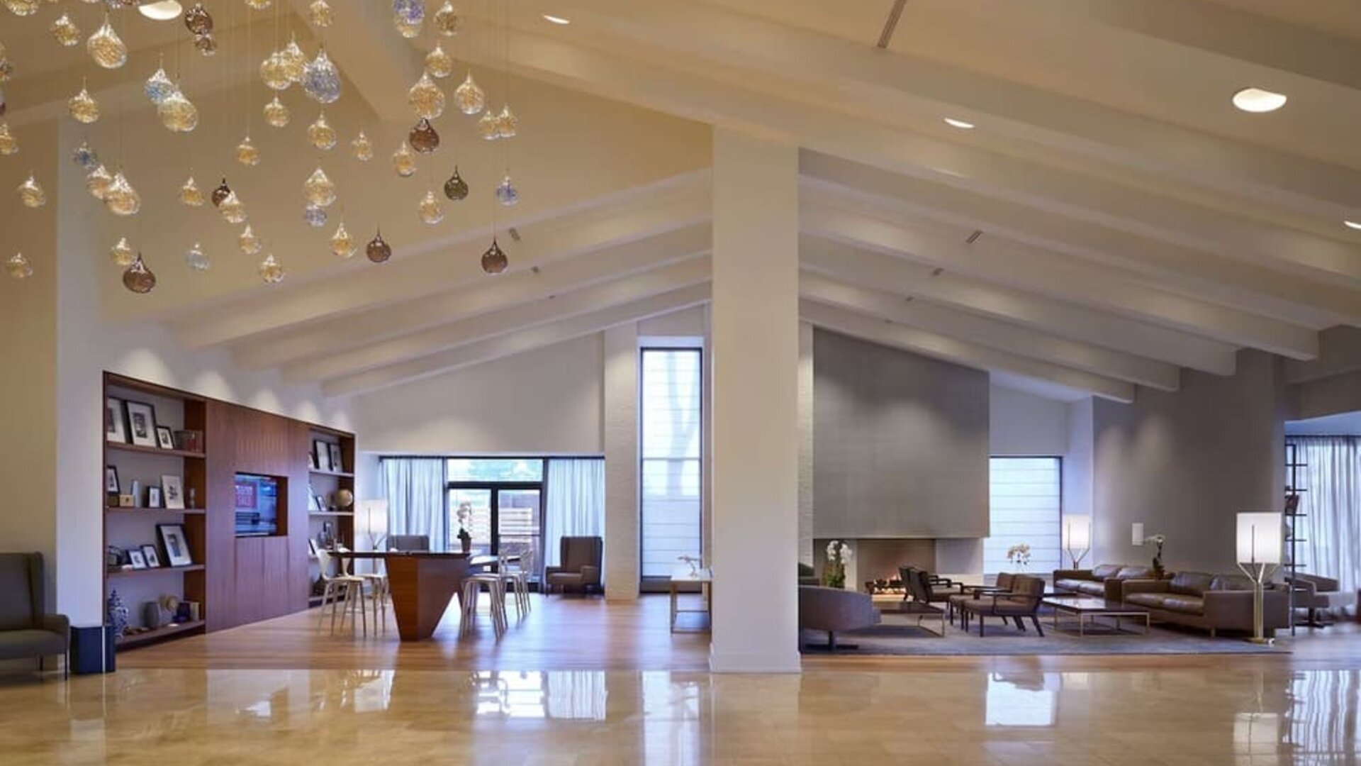 Hotel lobby with lounge area and workspace at Hilton Mississauga Meadowvale.