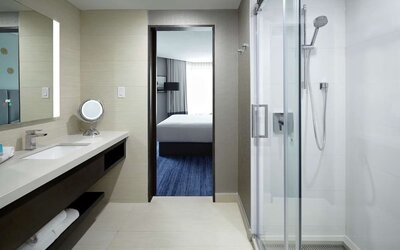 Private bathroom with shower at DoubleTree By Hilton Montreal.
