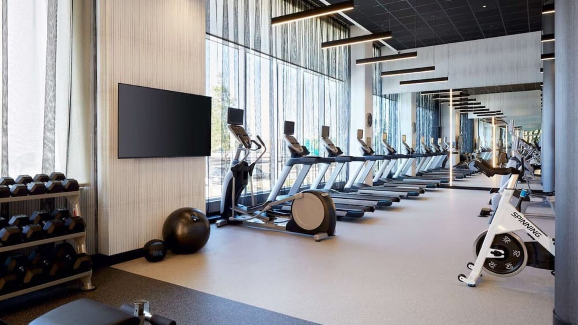Fully equipped fitness center at Hilton Garden Inn Montreal Midtown.