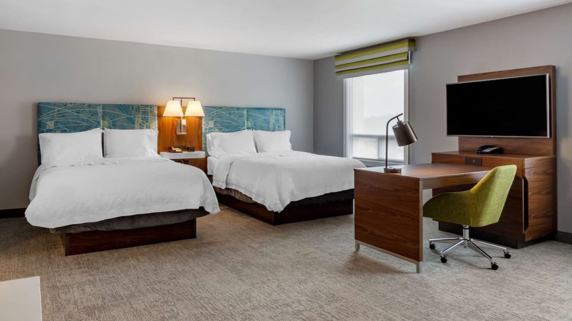 Day use twin suite with work station, lounge area and private bathroom at Hampton Inn & Suites By Hilton Edmonton/West.