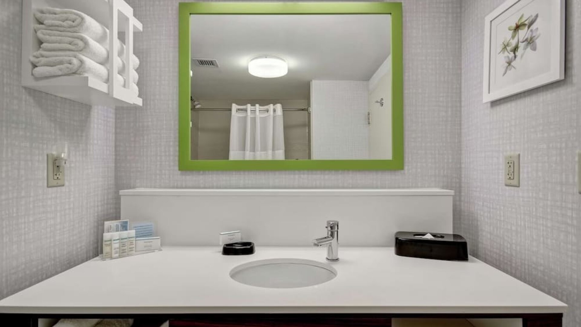 Private bathroom with free toiletries at the  Hampton Inn & Suites By Hilton Guelph.