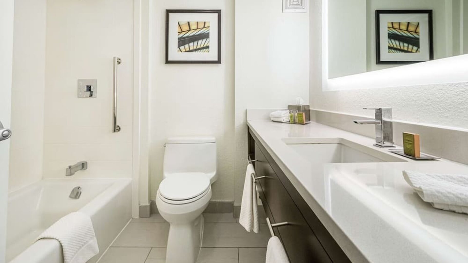 Private bathroom with tub and free toiletries  at DoubleTree By Hilton Kitchener.