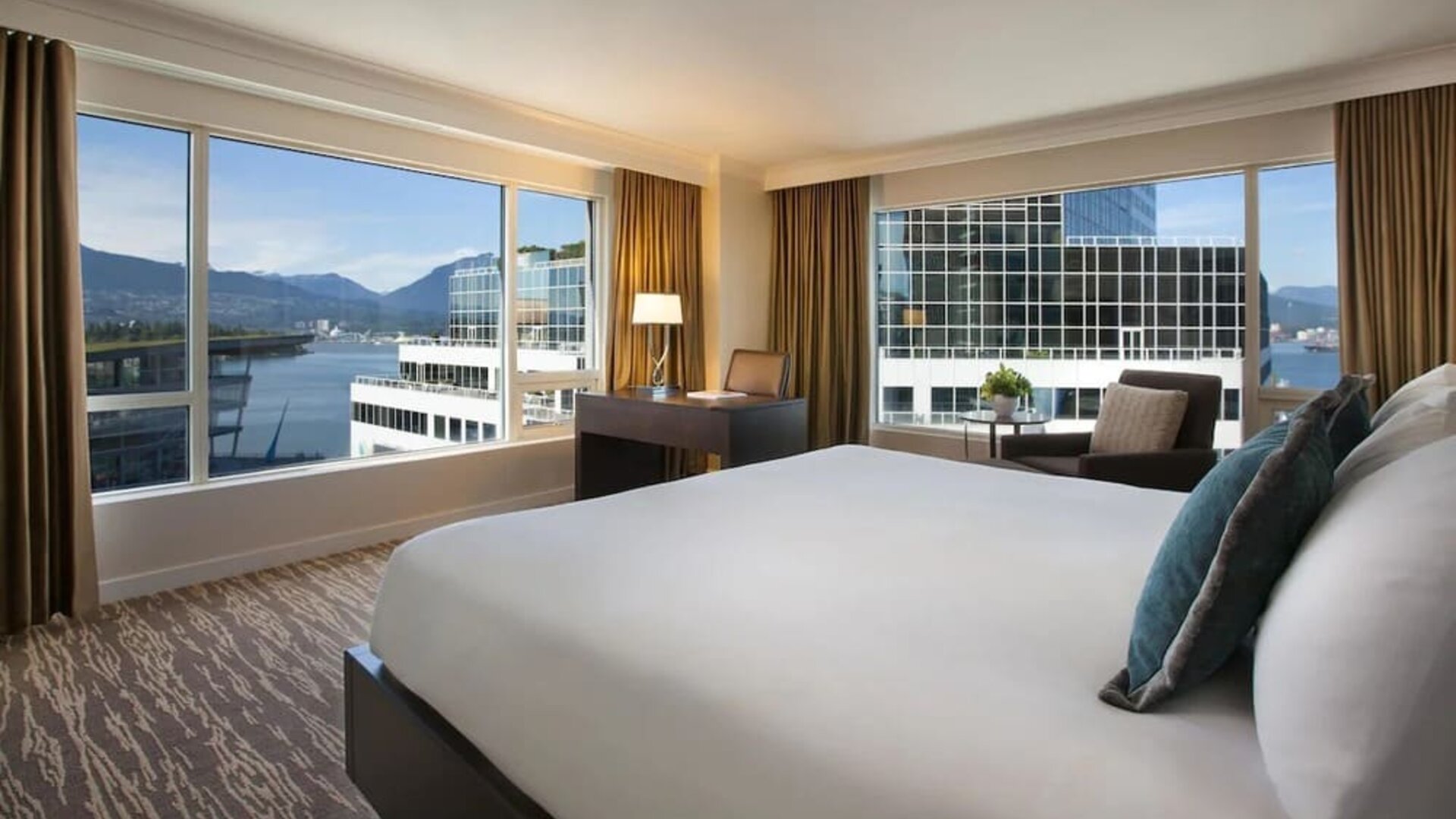 Day use room with work desk, sofa and private bathrom at the Fairmont Waterfront.