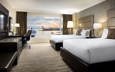 Day use twin room with TV, work desk and private bathroom at the Fairmont Waterfront.