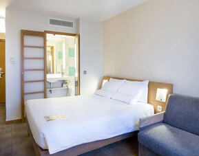 Day use room with sofa at Novotel London Paddington.
