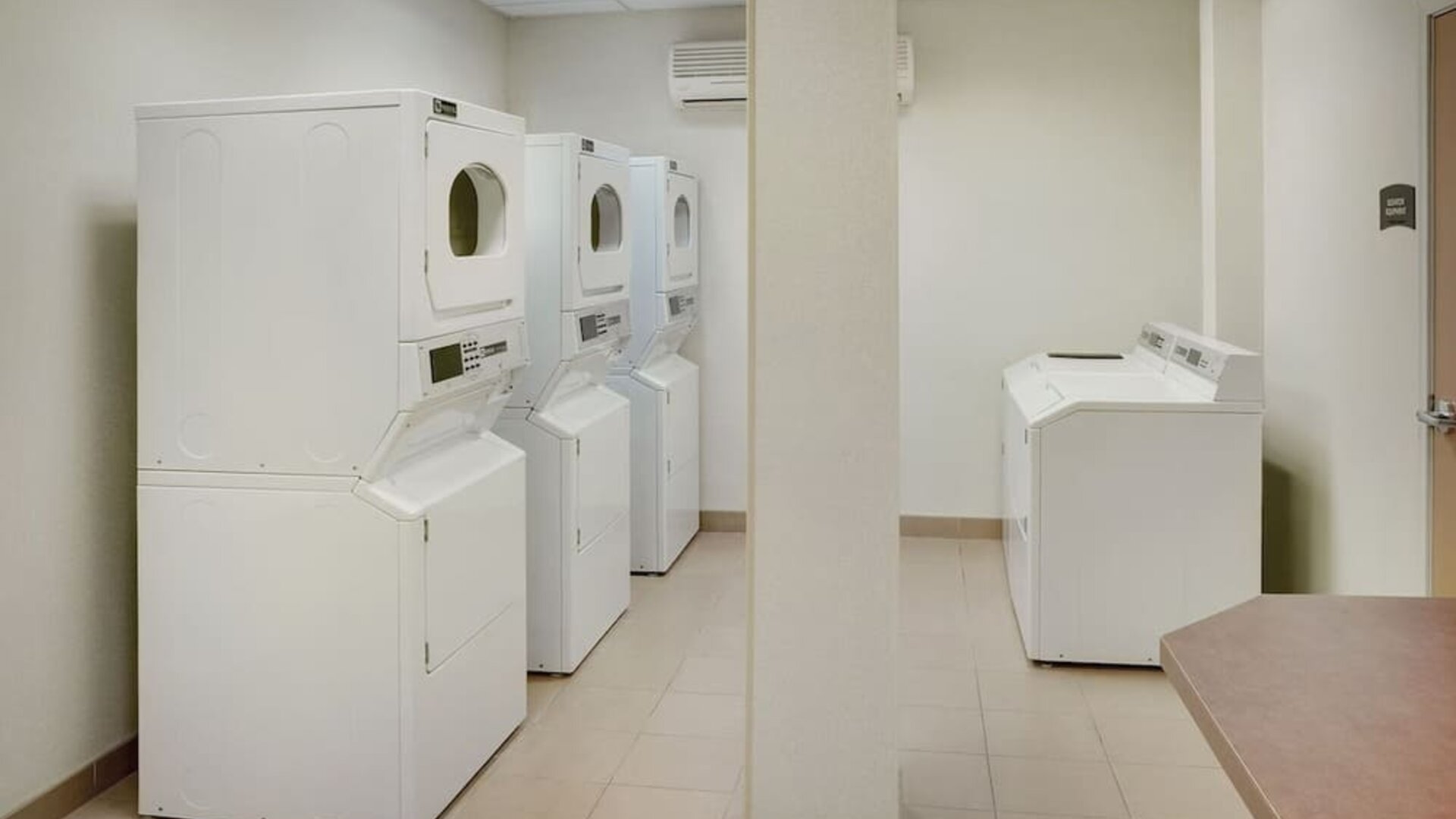 Laundry room at Staybridge Suites Oakville-Burlington.