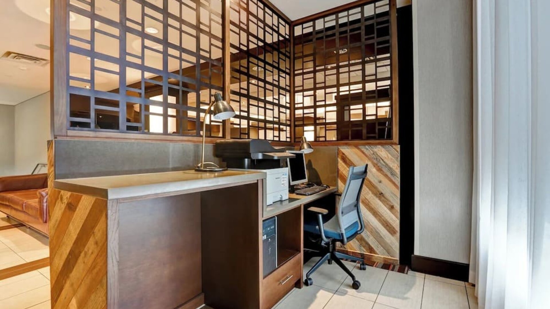 Business center with computer, printer and ergonomic seating at Four Points By Sheraton Toronto Mississauga.