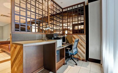 Business center with computer, printer and ergonomic seating at Four Points By Sheraton Toronto Mississauga.