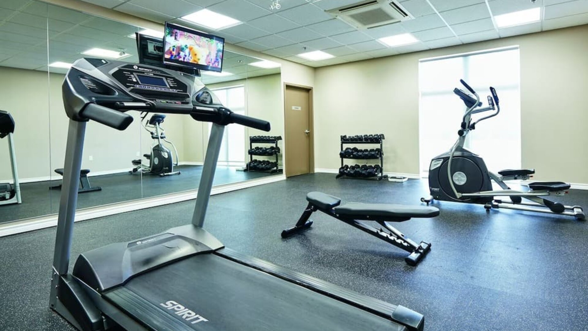 Fitness center at Quality Inn & Suites Kingston.