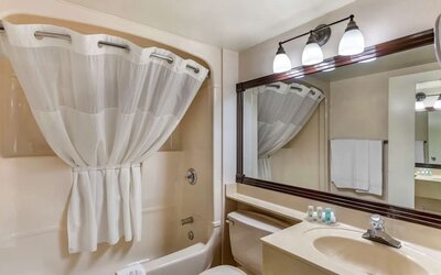 Private guest bathroom at Hampton Inn by Hilton Montreal East Anjou.