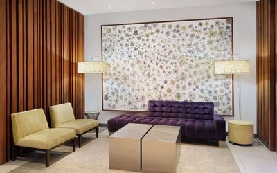 Lobby and coworking lounge at Best Western Premier Herald Square.