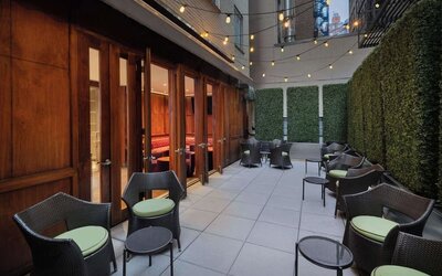 Veranda with ample seats perfect for coworking at Best Western Premier Herald Square.