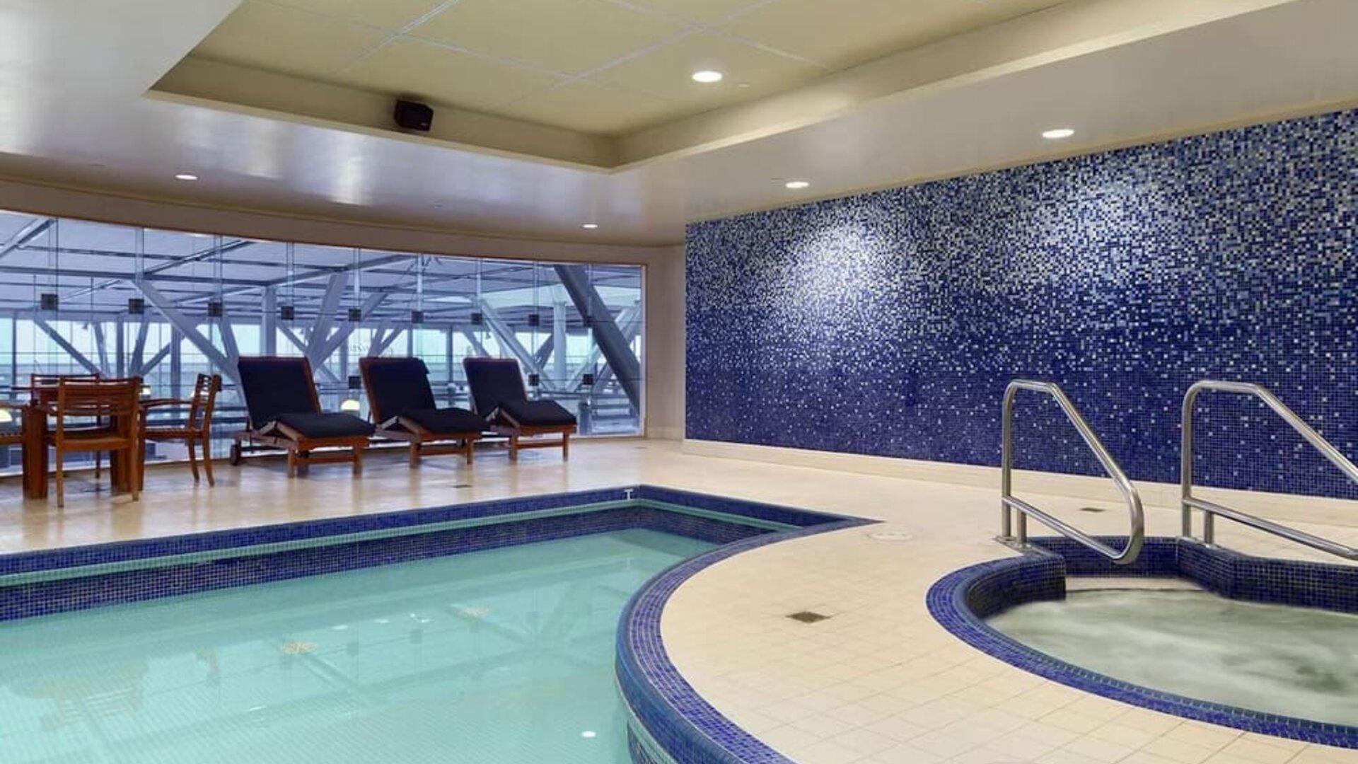Relaxing indoor pool at Fairmont Vancouver Airport - YVR Terminal Hotel.