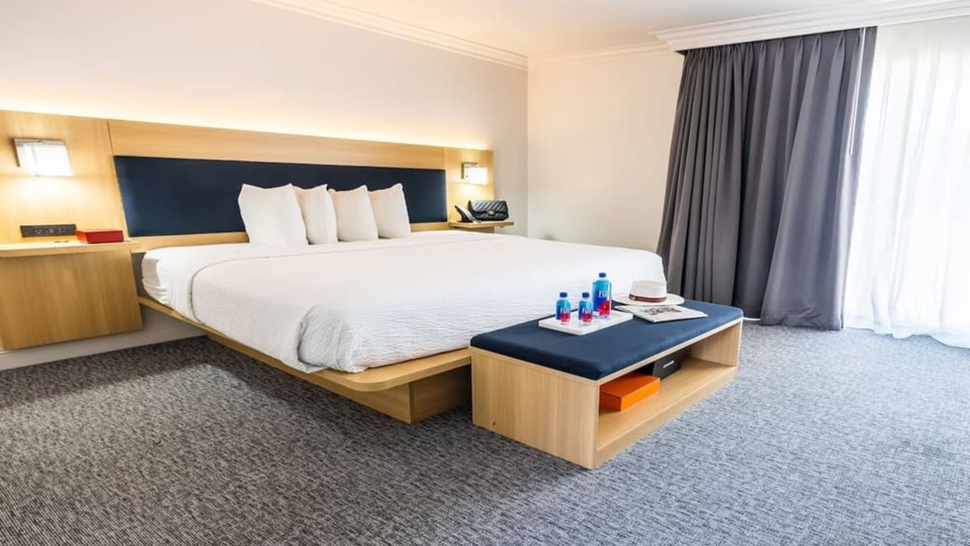 Spacious day use room with natural light at The Live Hotel.