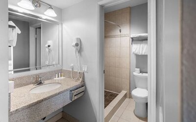 Guest bathroom with shower at The Live Hotel.