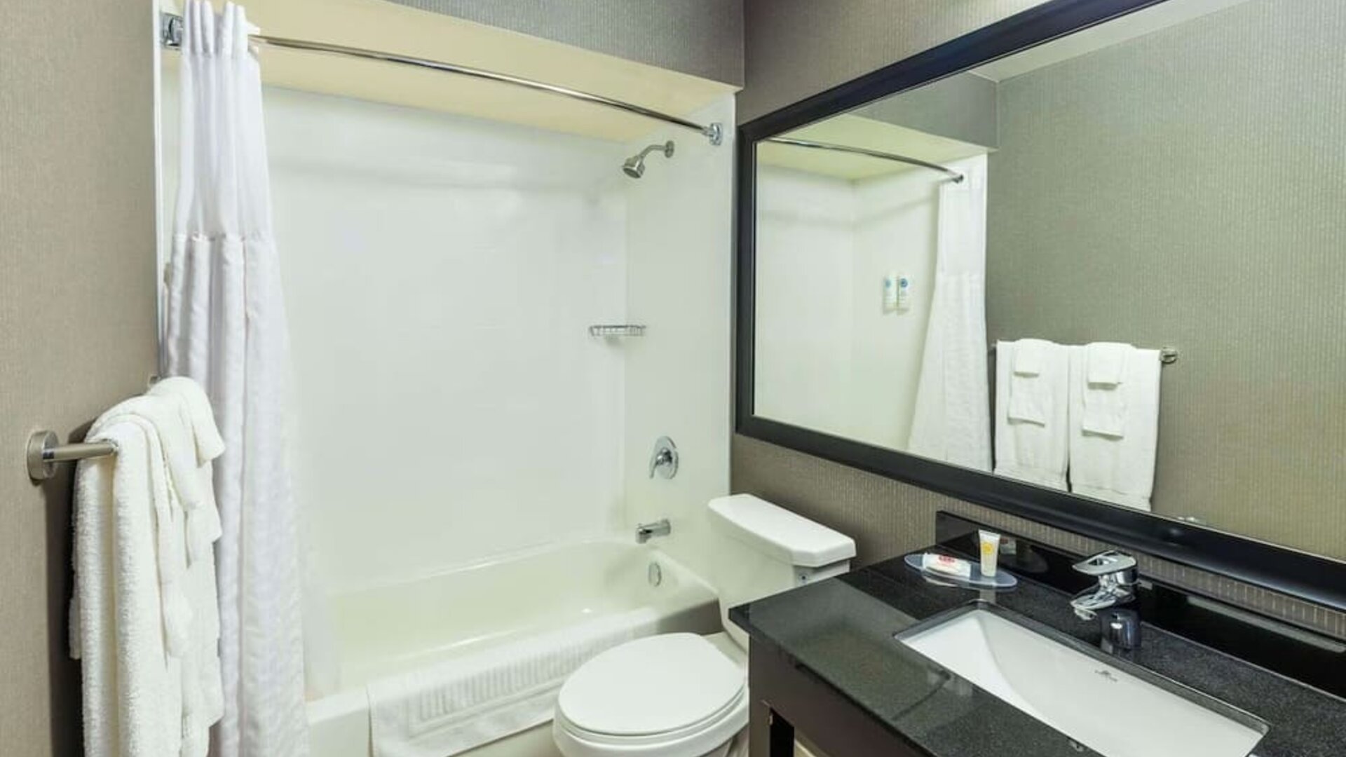 Private guest bathroom with tub at Comfort Inn Corner Brook.