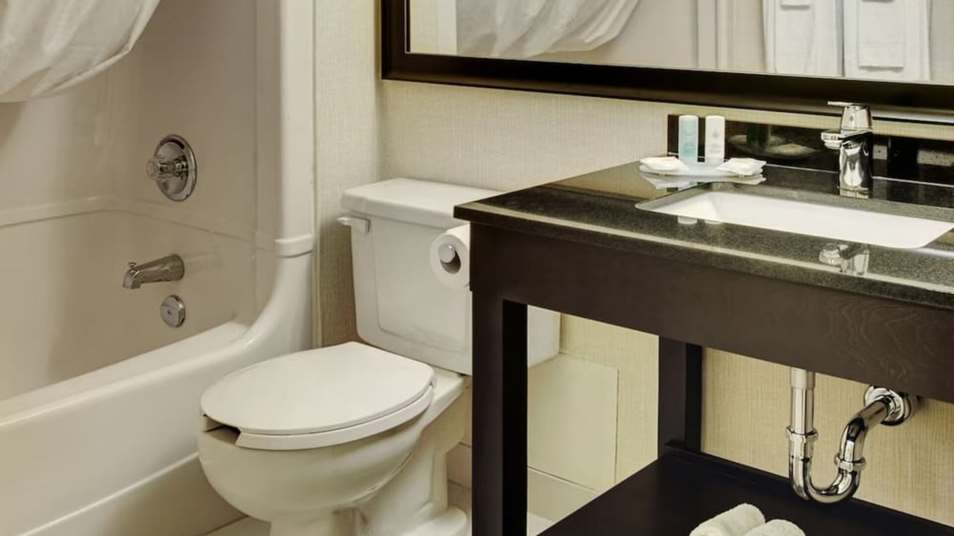 Guest bathroom with tub at Comfort Inn Yarmouth.