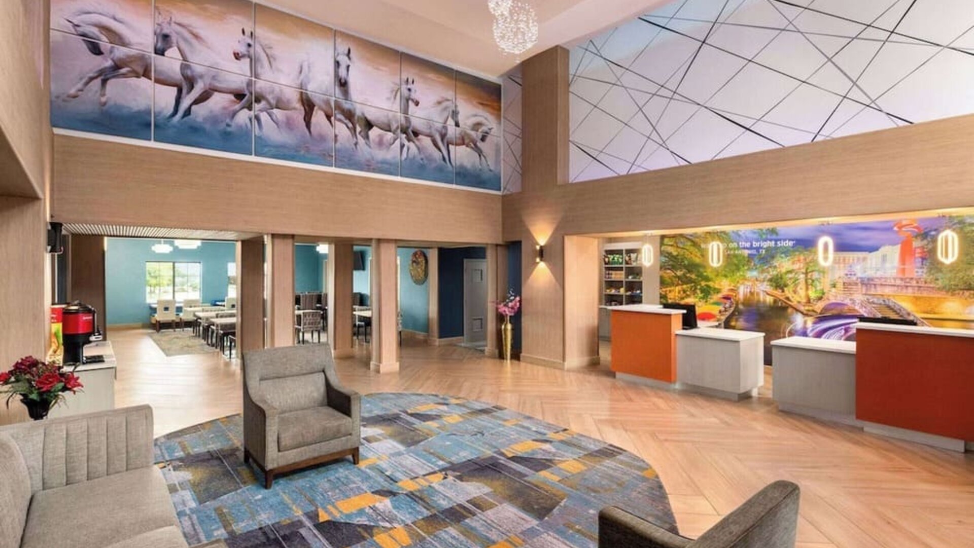 Lobby and coworking lounge at La Quinta Inn & Suites - North Stone Oak.