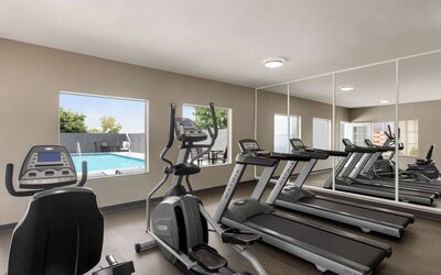 Fitness center available at La Quinta Inn & Suites - North Stone Oak.