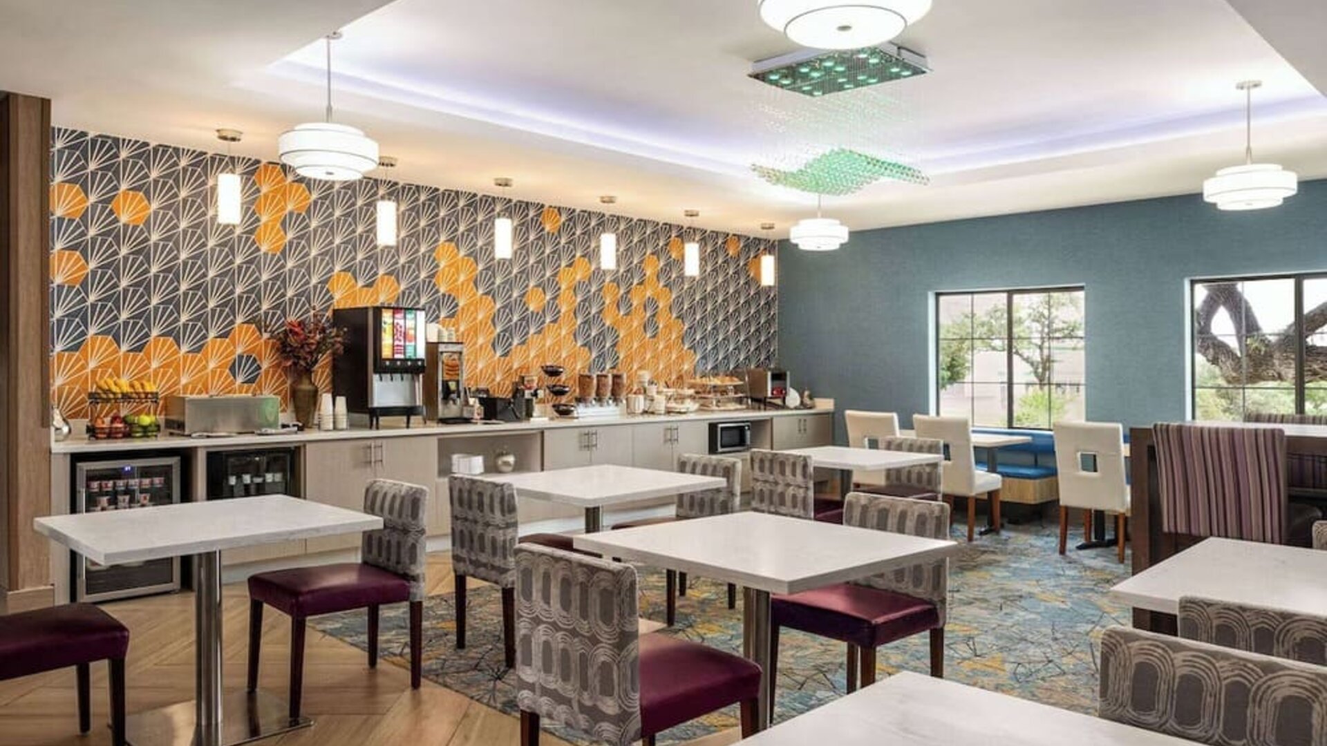 Dining area perfect for coworking at La Quinta Inn & Suites - North Stone Oak.