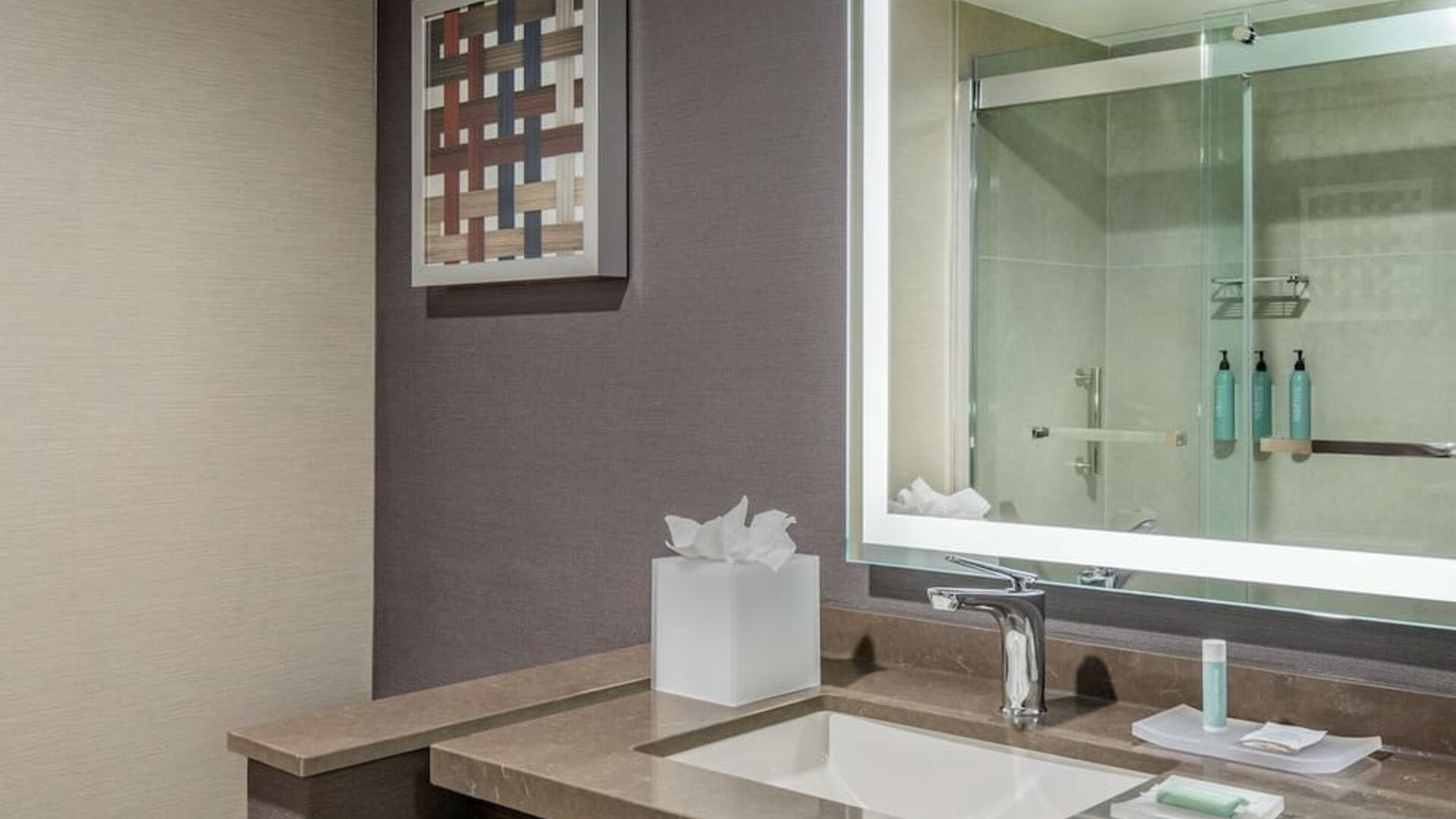 Guest bathroom with shower at Courtyard Boston Marlborough.