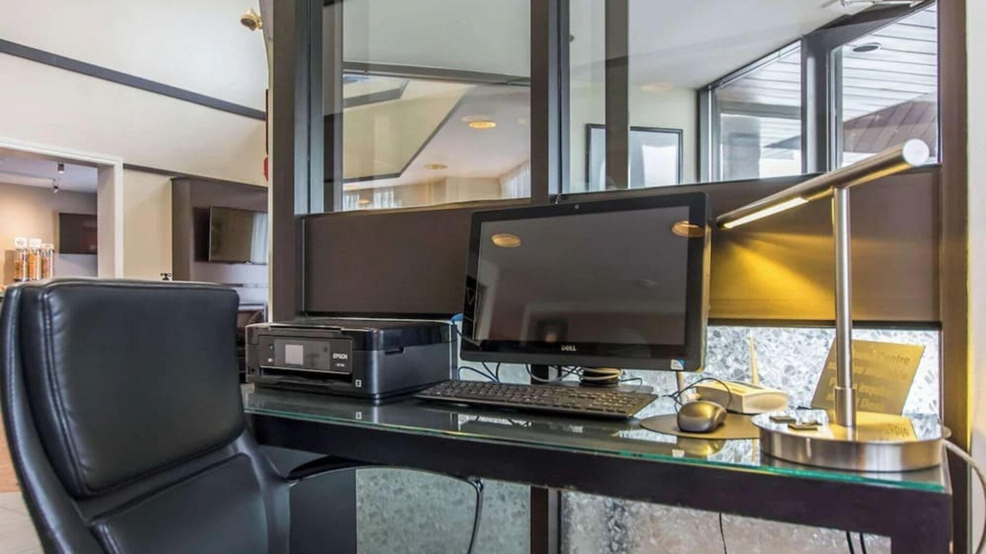 Business center with computer, printer and ergonomic chair at Comfort Inn New Glasgow.