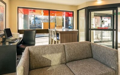 Lobby lounge with workspace at Comfort Inn Ottawa West.