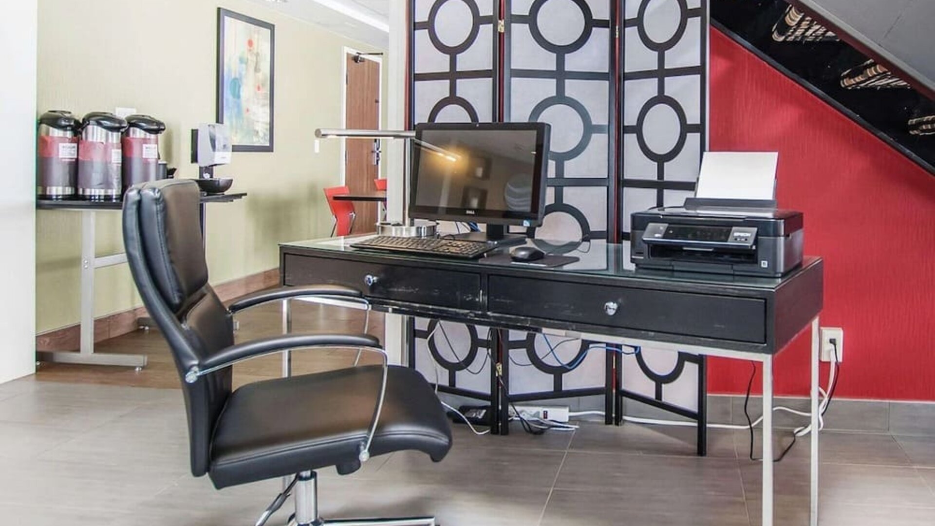 Business center with computer, printer and ergonomic chair at Comfort Inn Edmundston.