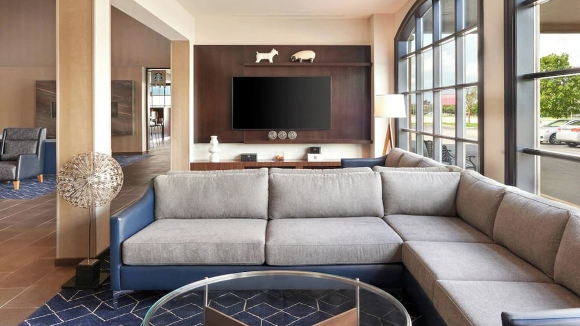 Comfortable lobby lounge perfect for co-working at Courtyard By Marriott Waterloo St. Jacobs.