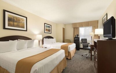 Bright and spacious day use room with TV, work desk and private bathroom at Travelodge Edmonton South.