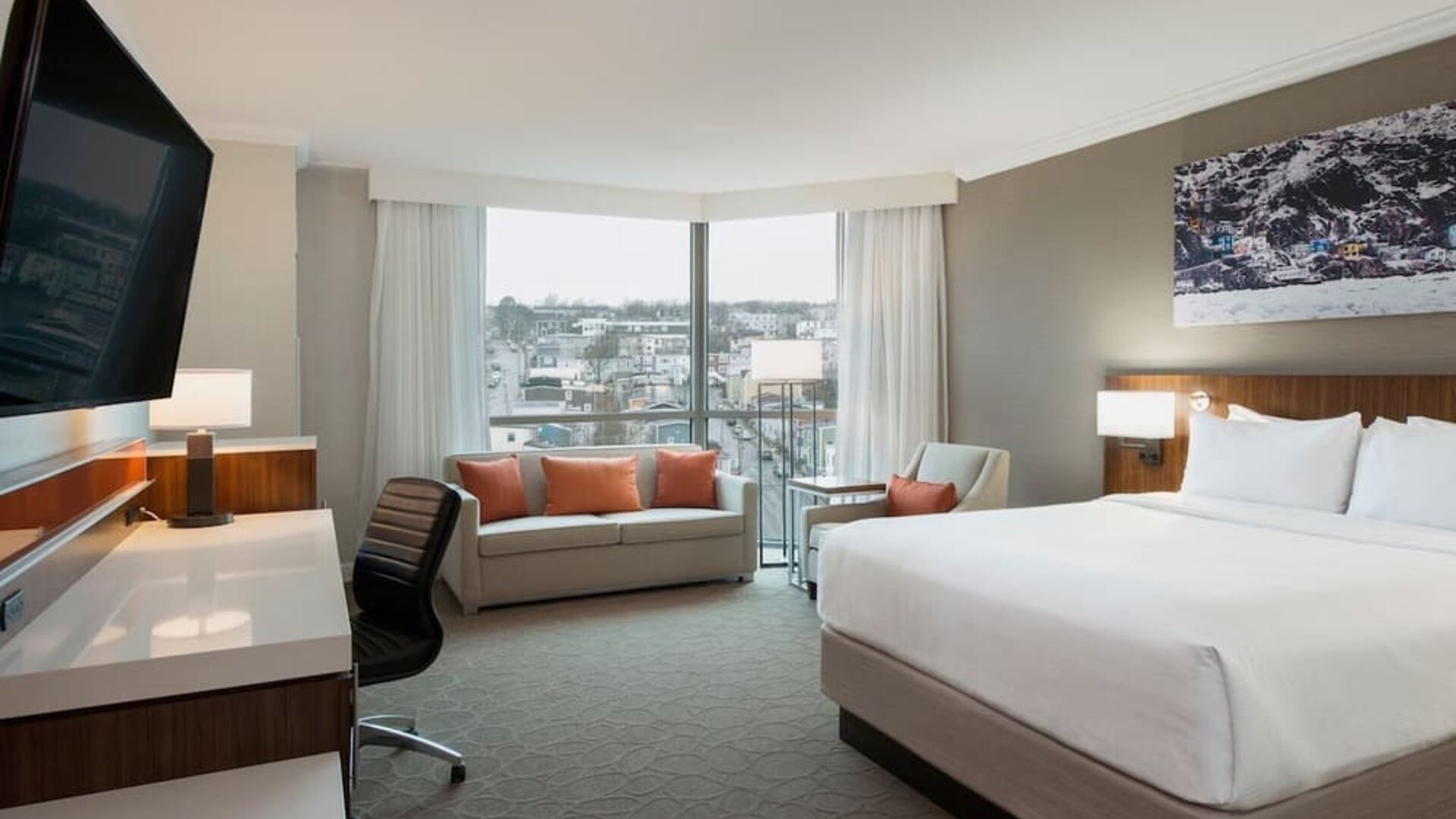 Day use room with sofas and work desk at Delta St. John's Hotel & Conference Center.