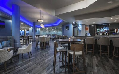 Hotel bar with lounge sitting at Delta Hotel By Marriott Regina.