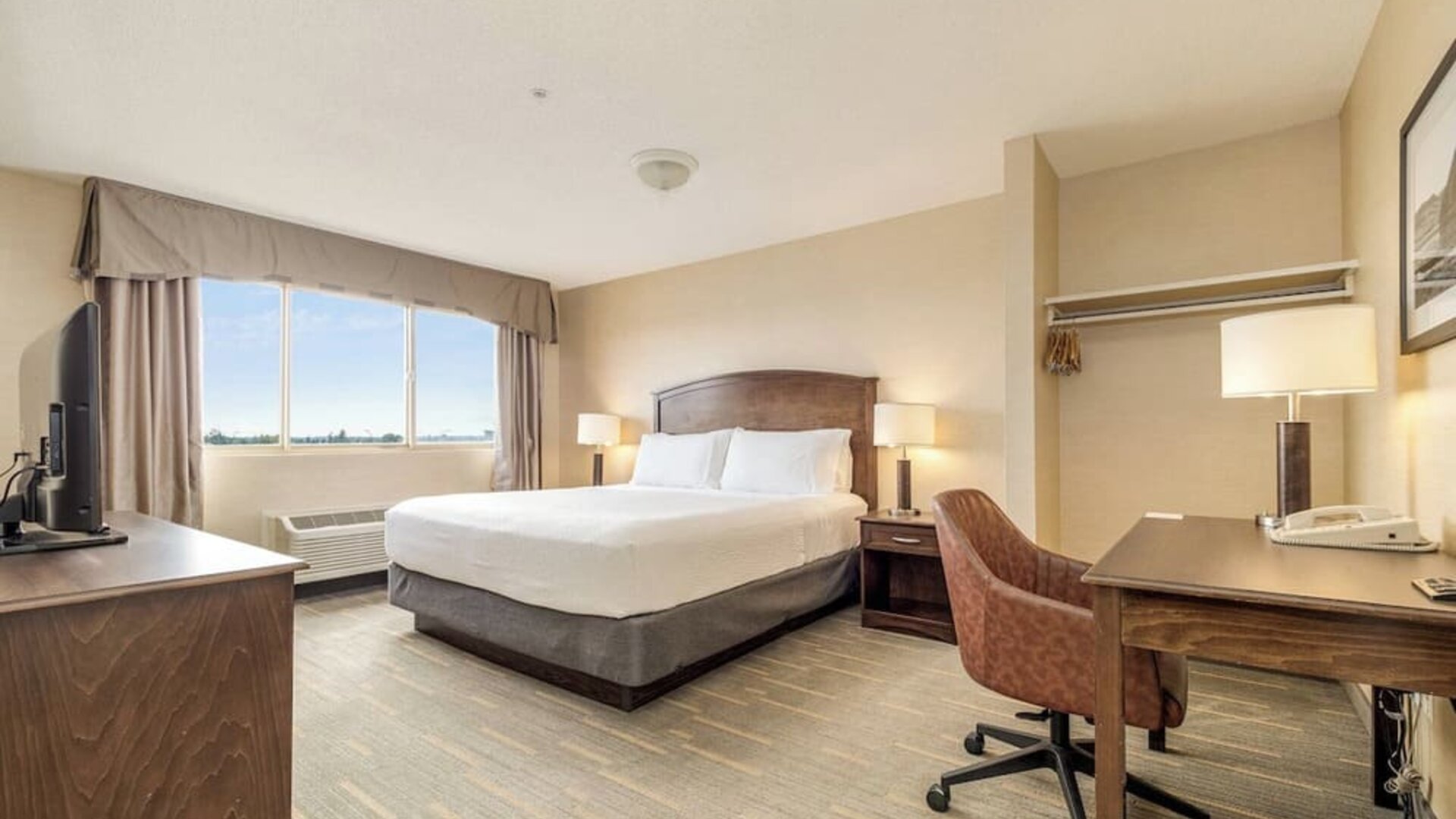 Bright and spacious day use room with work desk at Holiday Inn Lethbridge. 