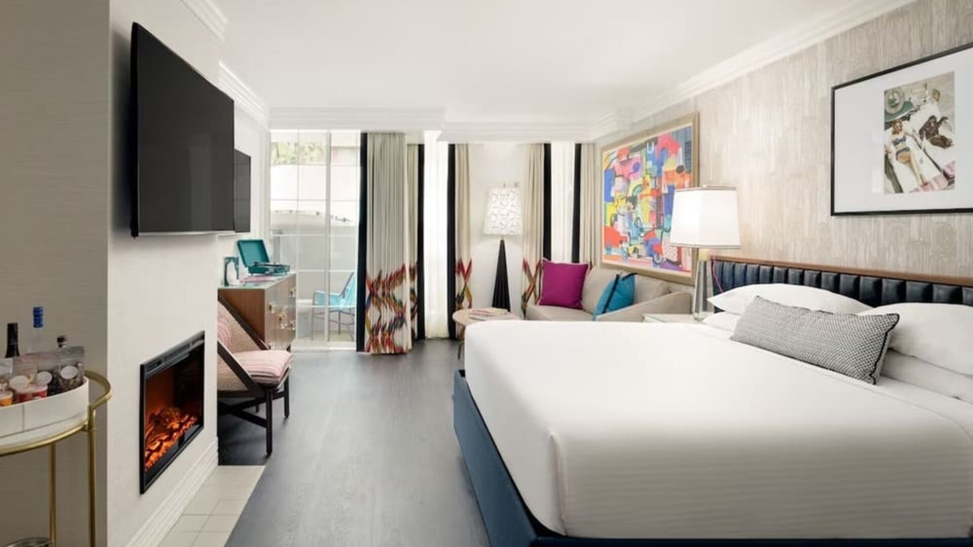 Day use room with balcony and sofa at Le Parc At Melrose.