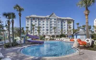 Refreshing outdoor pool with slide at Holiday Inn Express & Suites S Lake Buena Vista.